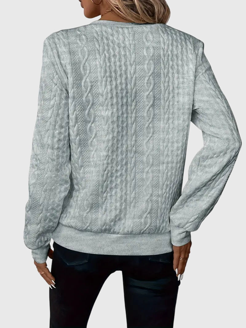 "Nora | Elegancki Sweter z Półzamkiem" could be rewritten as "Nora | Stylowy Sweter z Półzamkiem".
