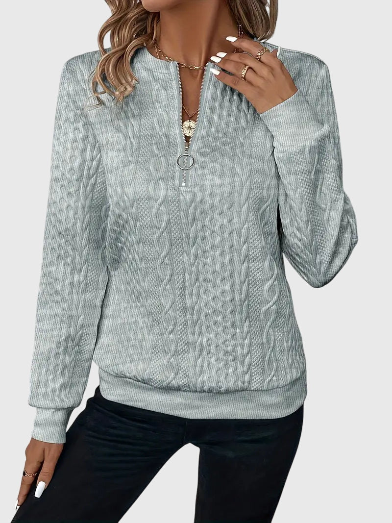 "Nora | Elegancki Sweter z Półzamkiem" could be rewritten as "Nora | Stylowy Sweter z Półzamkiem".