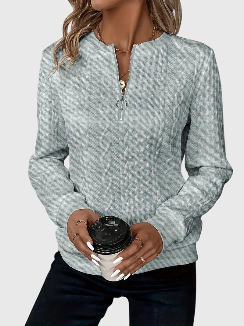 "Nora | Elegancki Sweter z Półzamkiem" could be rewritten as "Nora | Stylowy Sweter z Półzamkiem".