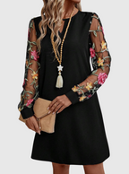 JOLANTA | Elegancka sukienka z dekoltem w kształcie litery V i wyrazistymi rękawami